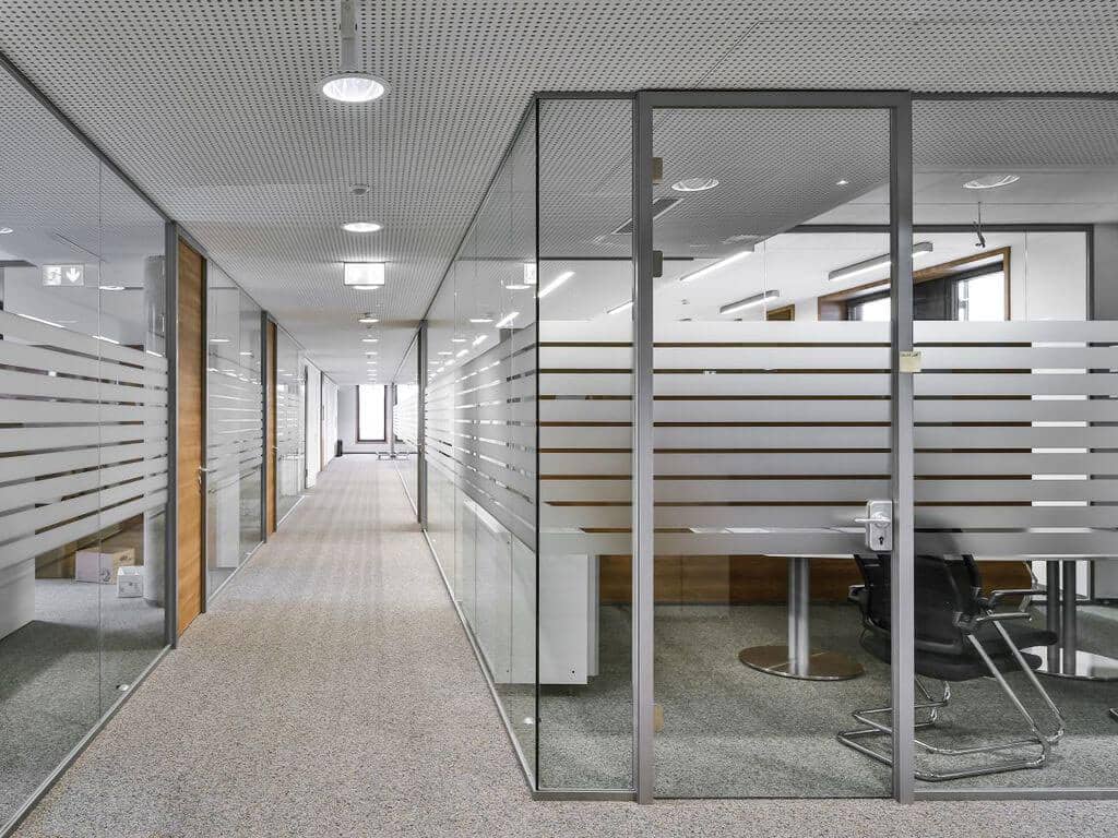 Glass wall Horizon office with wooden door