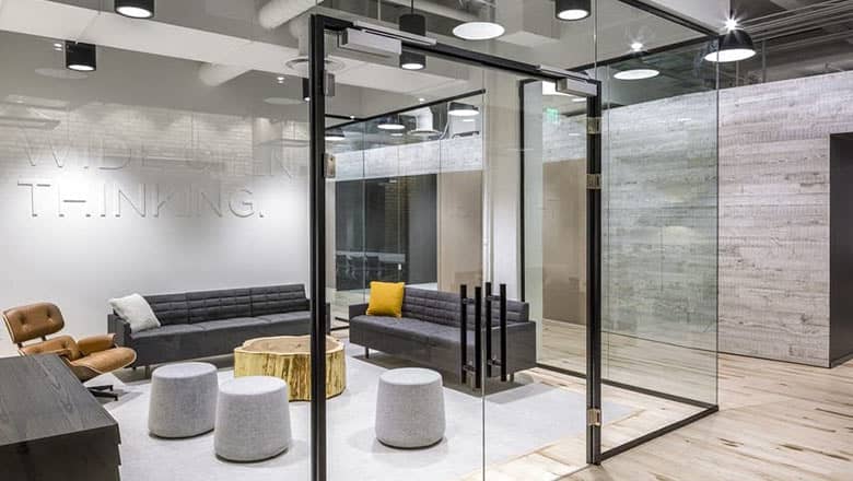 Glass wall partition meeting space